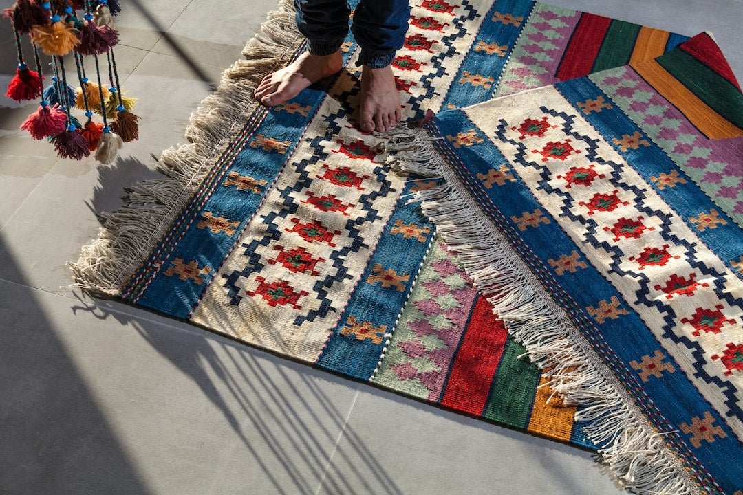 African-Inspired Rugs and Carpets: Adding Warmth and Texture to Your Home - Paulski Art 