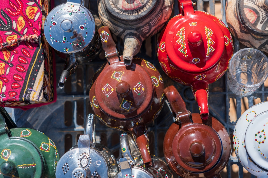 Collection of vibrant, decorative moroccan teapots.
